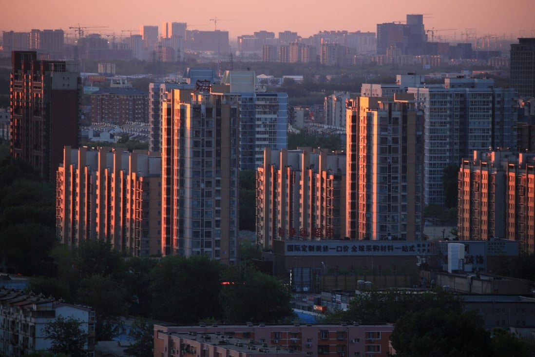 Property buildings are seen against the dawn sky in Beijing on April 25, 2017. Photo: REUTERS