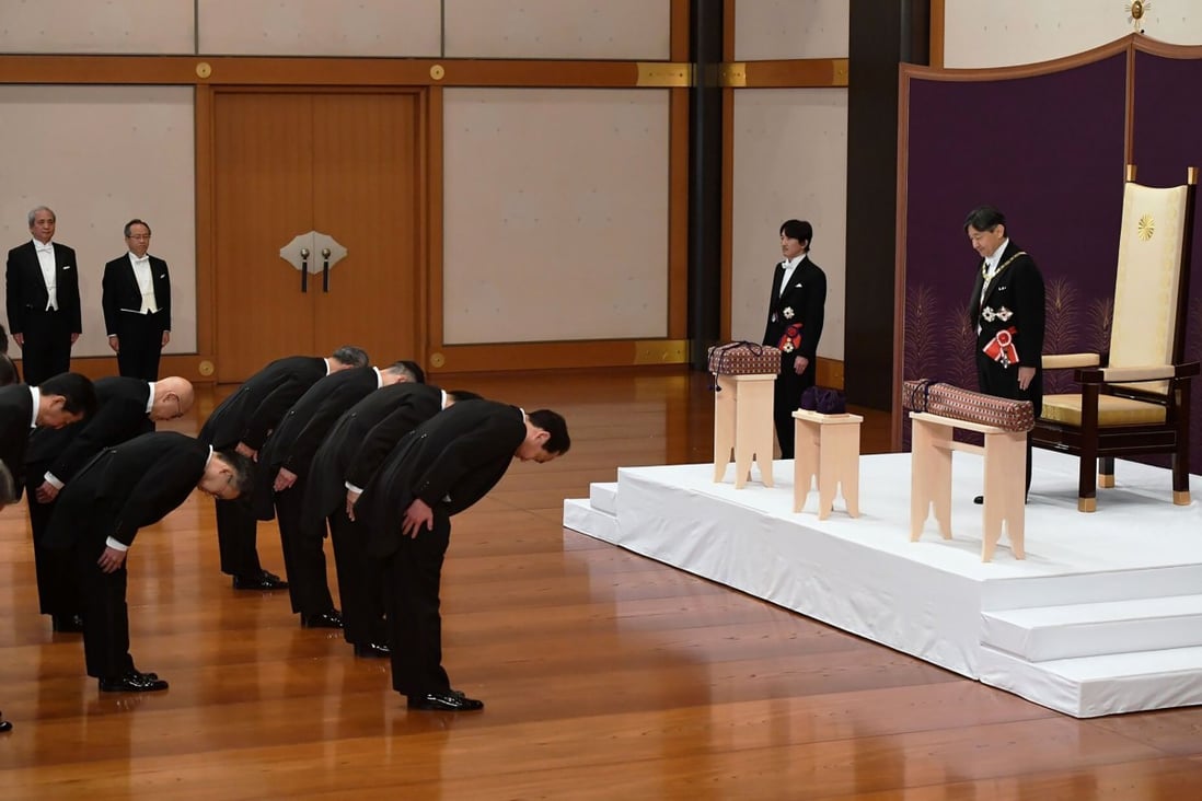 Emperor Naruhito (right) inherits the imperial regalia. Photo: AFP