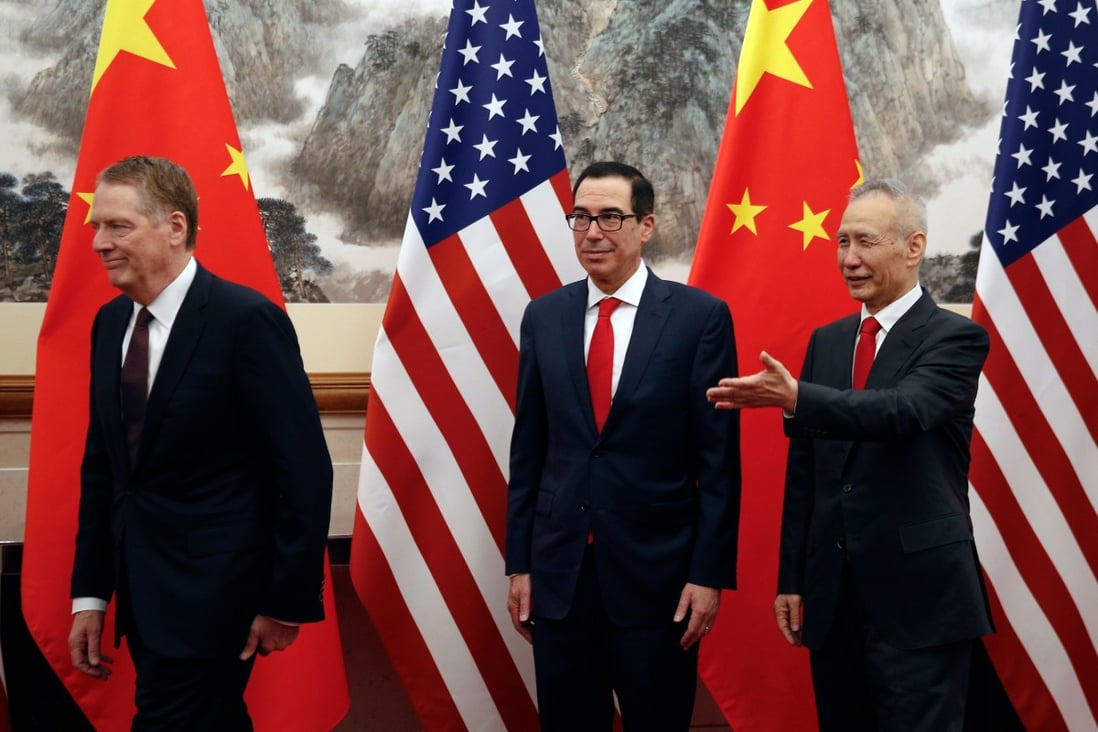 Chinese Vice Premier Liu He shows the way to US Treasury Secretary Steven Mnuchin and US Trade Representative Robert Lighthizer as they proceed to their meeting at the Diaoyutai State Guesthouse in Beijing on May 1, 2019. Photo: AFP