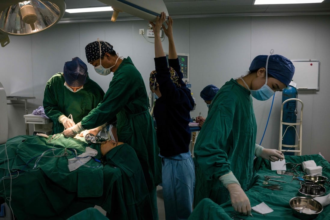 In this photograph a woman undergoes a plastic surgery procedure at Huamei Medical Cosmetology Hospital in Shanghai. Plastic surgery is booming in China, fuelled by rising incomes, growing Western influences and the imperative of looking good on social media. Photo: AFP