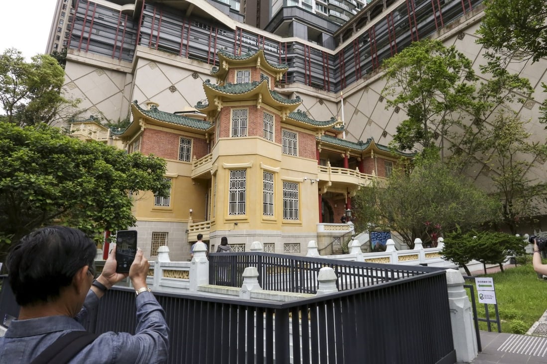 Visitors take pictures at the recently reopened Haw Par Mansion in Tai Hang. Photo: Jonathan Wong