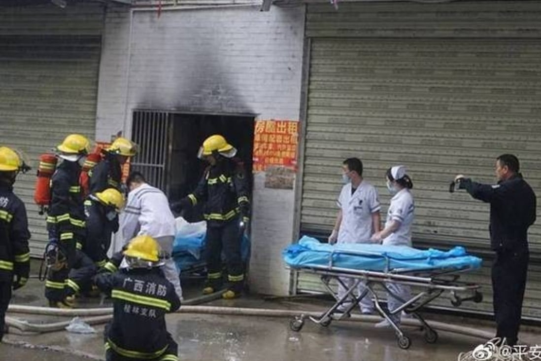 Rescue teams in Guilin attend a fire at a student dormitory where five people were killed and more than 30 injured. Photo: Weibo
