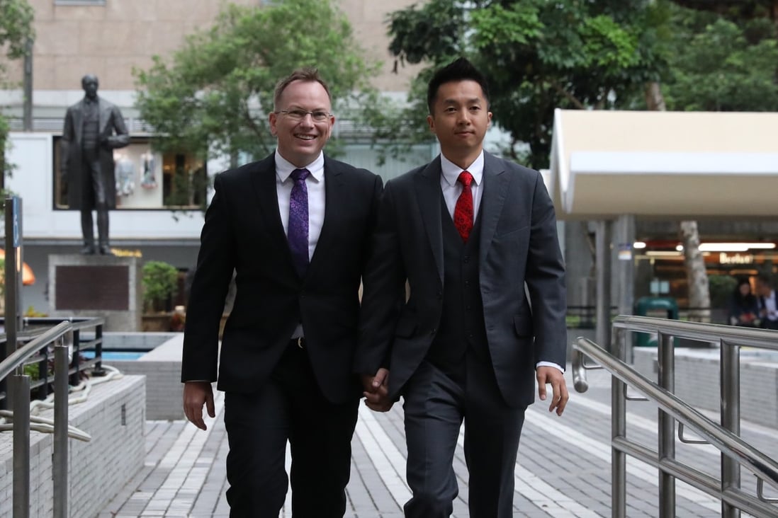 Senior immigration officer Angus Leung (right) and his partner Scott Adams arrive at the Court of Final Appeal. Photo: Nora Tam