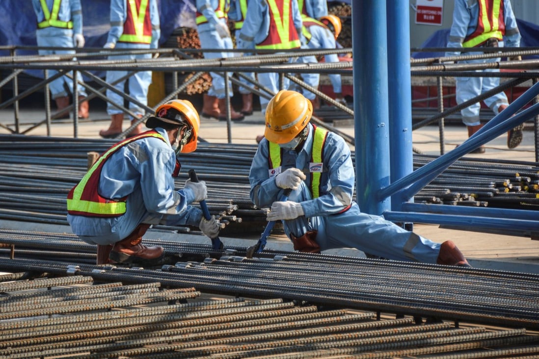 Workers reinforce steel for a section of the China-financed Jakarta-Bandung high-speed railway. Photo: Reuters