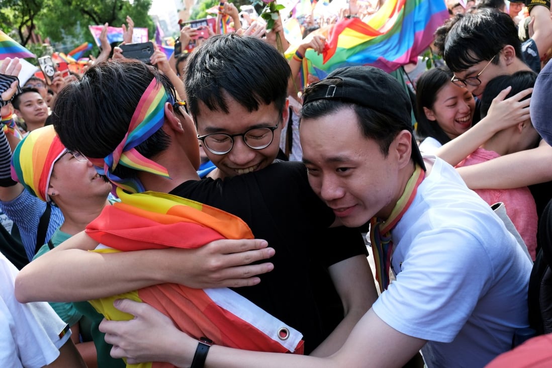 Supporters of same-sex marriage celebrate the Taiwanese legislature’s decision to legalise same-sex marriage in Taipei on Friday. Photo: Reuters