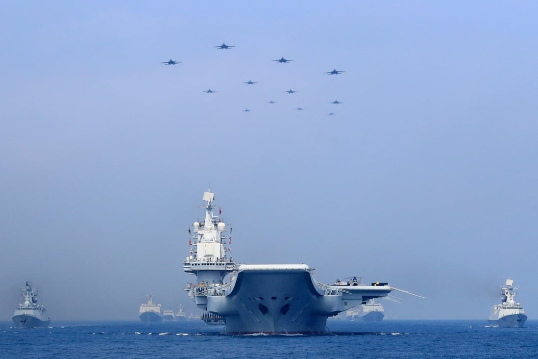 China’s navy stages a display in the South China Sea, parts of which are claimed by a number of its neighbours. Photo: Reuters