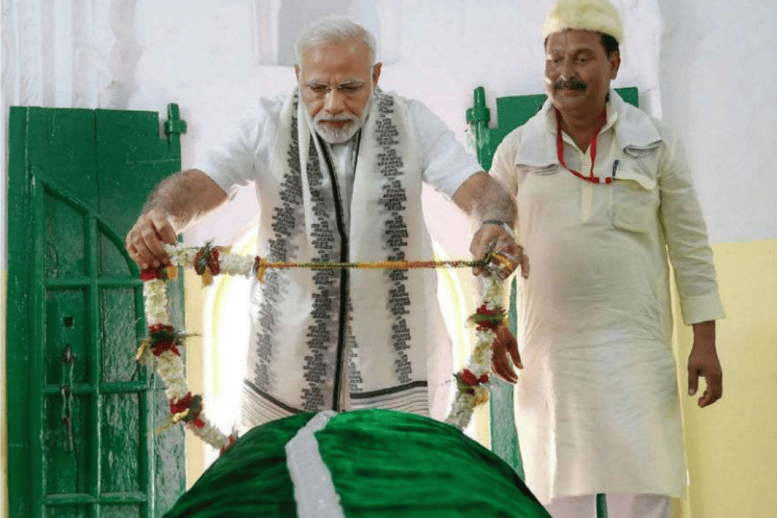 Prime Minister Narendra Modi paid a visit to Sant Kabir’s tomb in June 2018 to commemorate the 500th anniversary of his death. Photo: DNA India