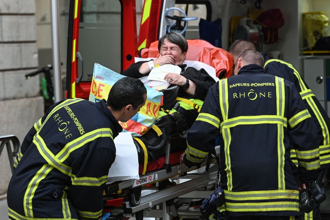 Police hunt suitcase bomber after blast in French city of Lyon injures