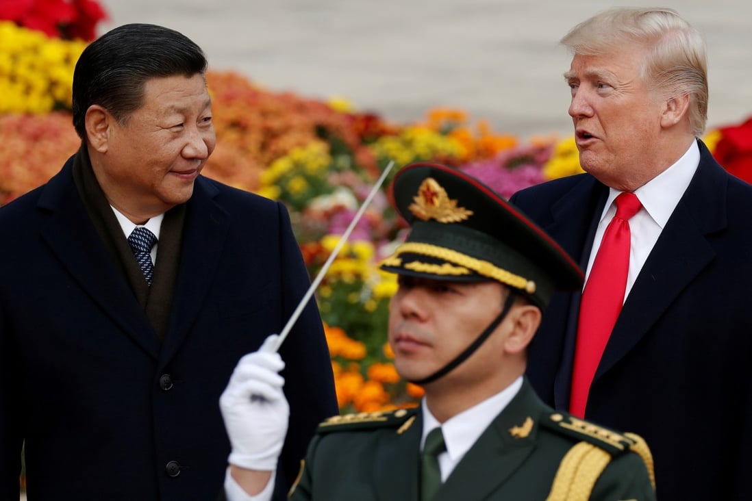 US President Donald Trump at a welcoming ceremony in Beijing with China's President Xi Jinping in 2017. Photo: Reuters