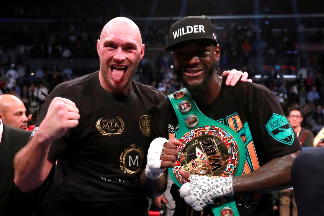 Tyson Fury and Deontay Wilder pose after their December 2018 fight. Photo: Reuters