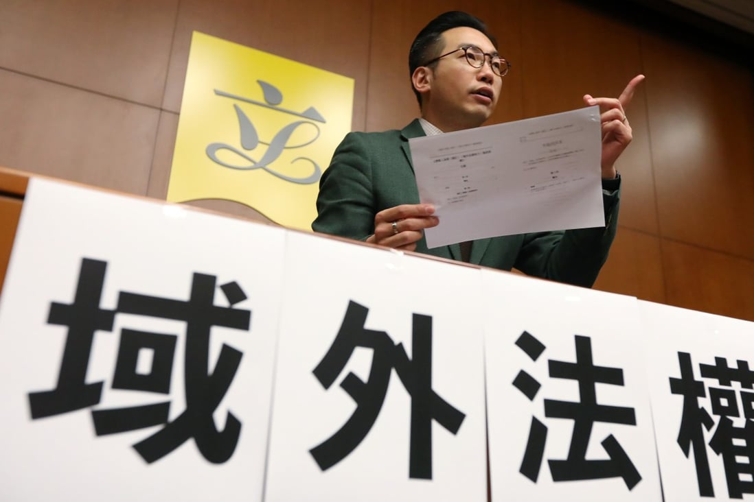 Civic Party leader Alvin Yeung explains his party’s proposal for a law granting Hong Kong the right to hear cases in which permanent residents are accused of murder abroad. Photo: Felix Wong