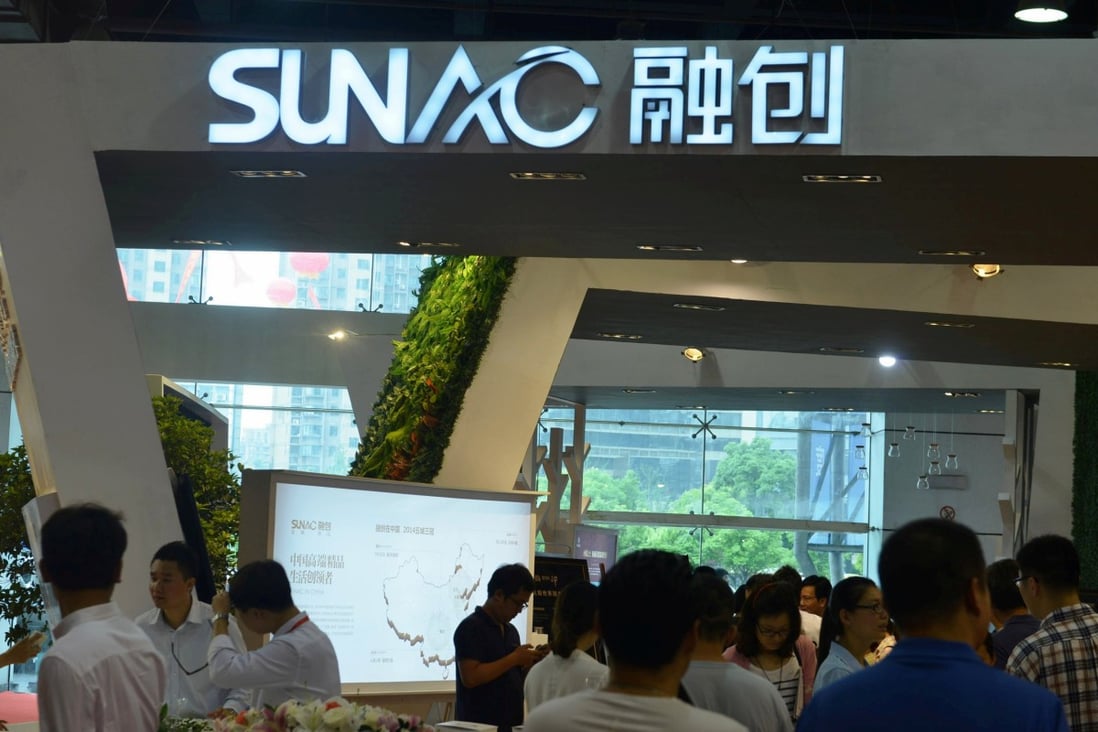 The Sunac China Holdings logo is seen during an exhibition in Hangzhou, Zhejiang province, on May 25, 2015. Photo: China Daily
