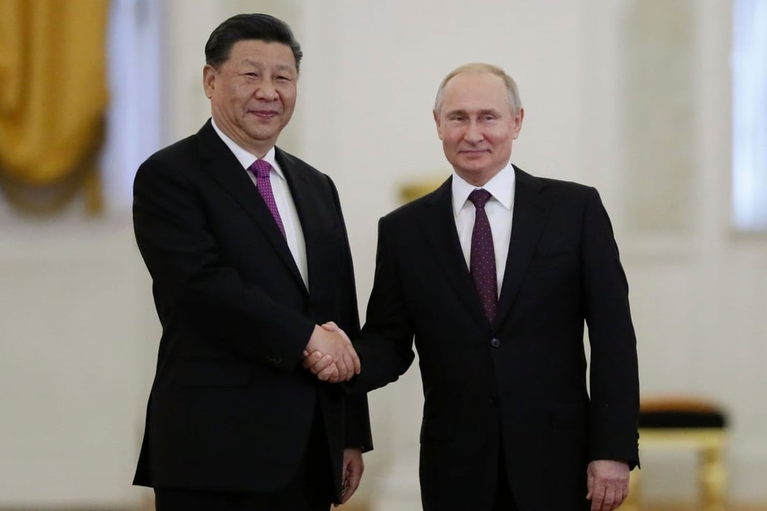 Russian President Vladimir Putin greets Chinese President Xi Jinping at the Kremlin in Moscow on Wednesday. Photo: AFP