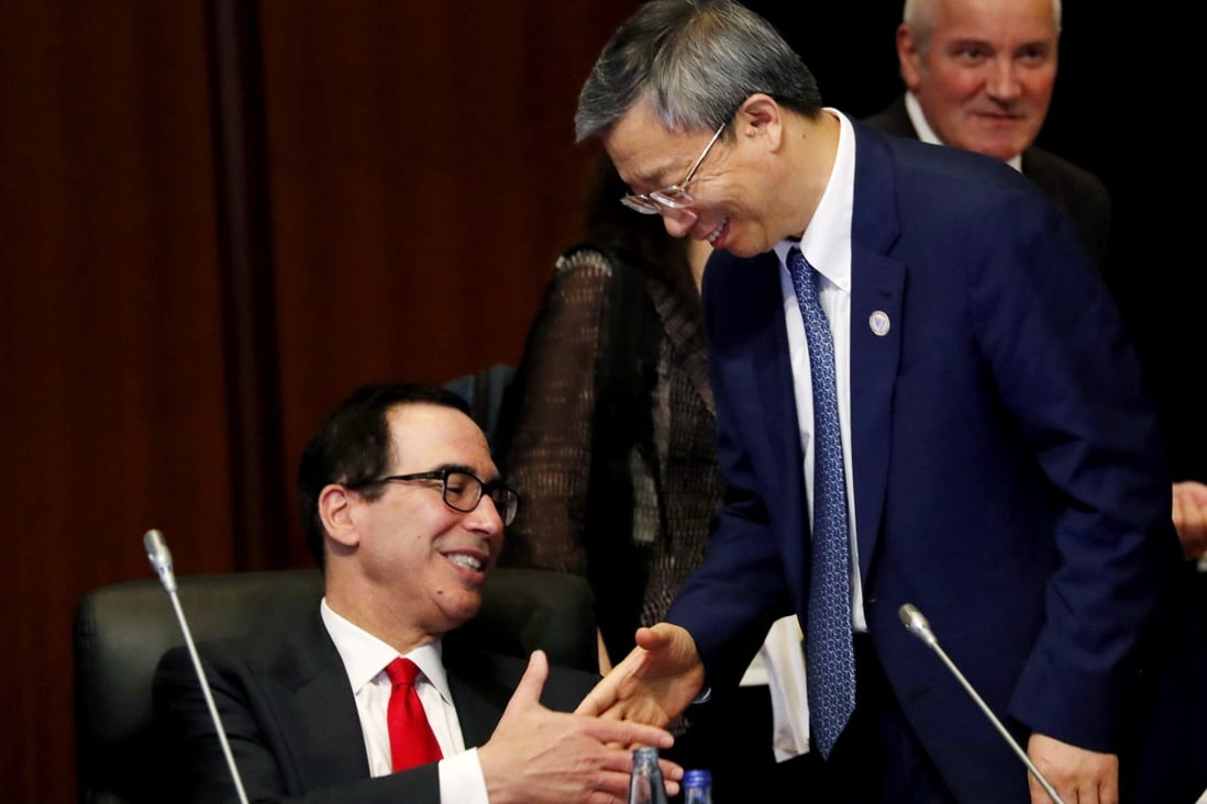 US Treasury secretary Steven Mnuchin with People's Bank of China governor Yi Gang in Japan. Photo: Bloomberg
