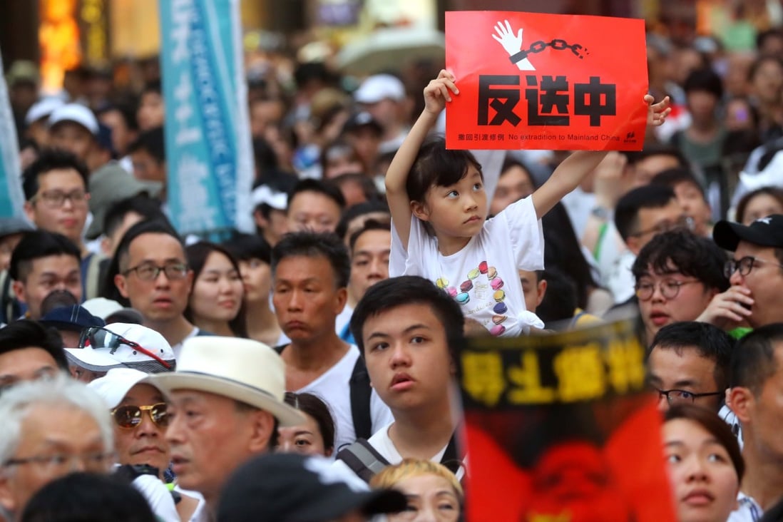 Protesters march from Causeway Bay to government headquarters in Admiralty on Sunday to protest against the extradition bill. Photo: Edmond So