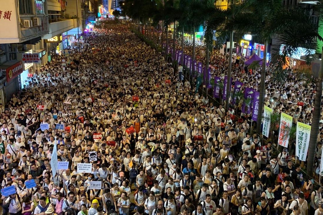 Such was the size of the crowds, they were still flocking to the rallying point long after the first marchers had left, and the tail end of the rally was still in Causeway Bay as night fell. Photo: Warton Li