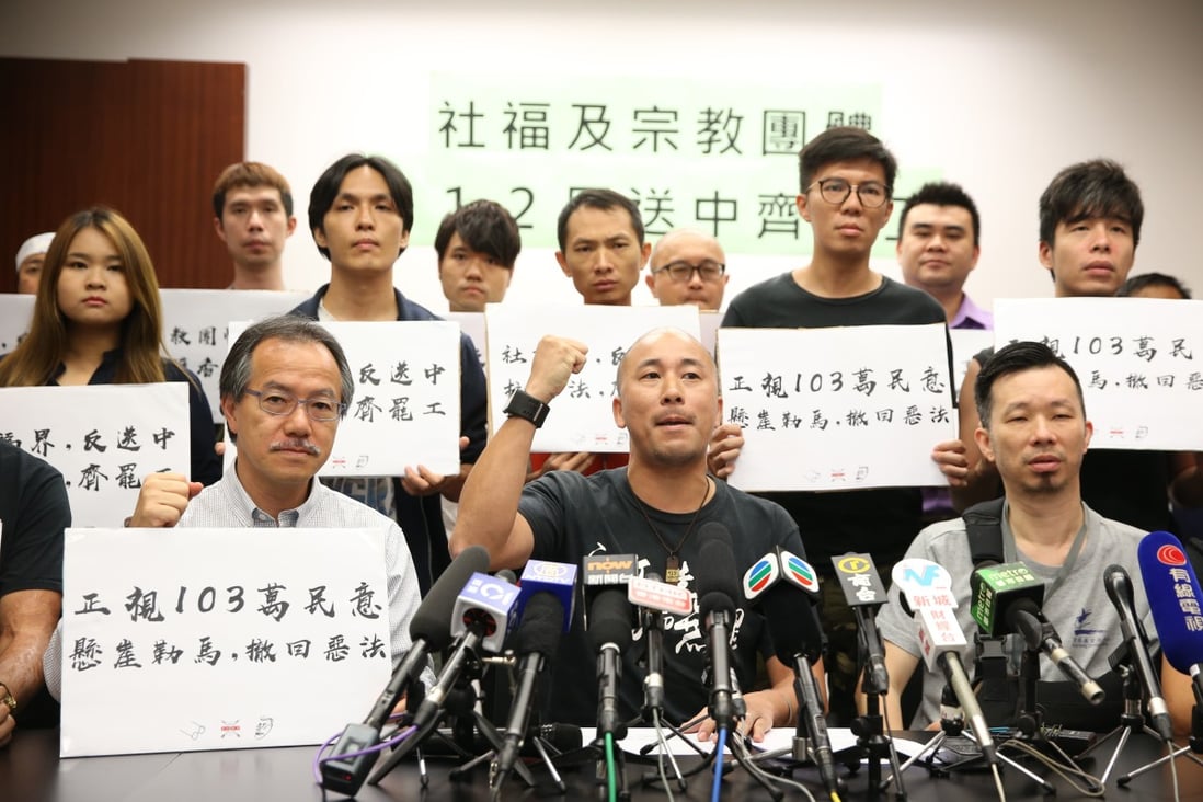 Officials, including lawmaker Fernando Cheung (front left), representing the welfare and religion sectors at a news conference on Tuesday. Photo: Winson Wong
