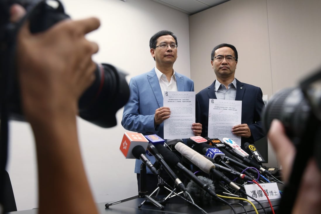 Ip Kin-yuen and Fung Wai-wah, of the Professional Teachers’ Union (PTU), call on members to join Wednesday’s protest against the extradition bill. Photo: Winson Wong