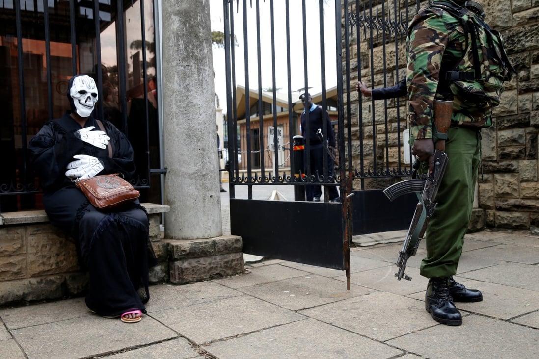 An environmental activist in costume during a protest against the Chinese-financed coal plant project in Kenya, outside parliament house in Nairobi last year. The project has stalled due to the storm of unhappiness locally. Photo: Reuters