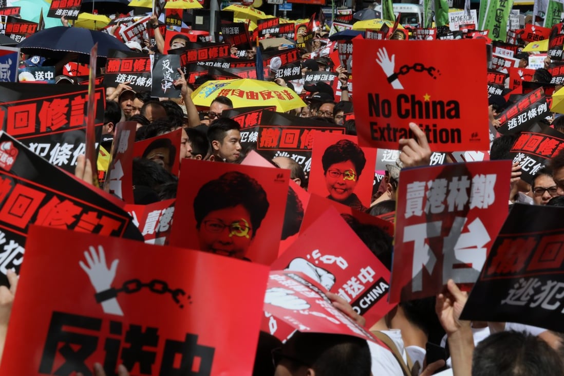 Protesters march against the extradition bill in Hong Kong on Sunday. Photo: KY Cheng
