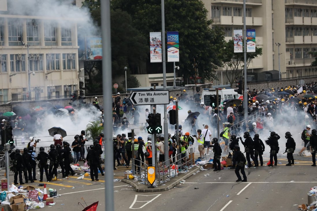 Police use tear gas to disperse protesters against the anti-extradition law in Hong Kong on Wednesday. Photo: Sam Tsang