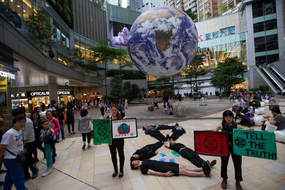 Members of Extinction Rebellion Hong Kong perform a silent “die-in” to demand quick action on climate change, at a shopping centre in Tsuen Wan on May 4. Photo: Handout