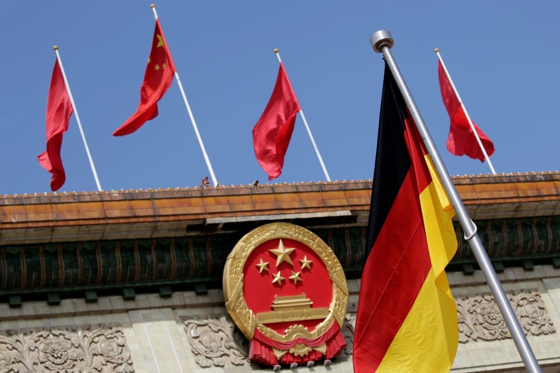 A German flag flutters outside the Great Hall of the People before a welcome ceremony for German Chancellor Angela Merkel in Beijing in May 2018. Photo: Reuters