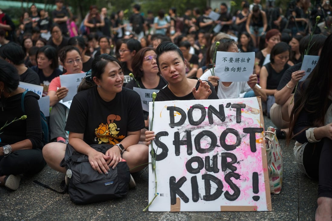 A group of Hong Kong mothers held a sit-in on June 14 to denounce the heavy-handed treatment of protesters by the police. While the visible face of the extradition protests appears strikingly young, opposition to the extradition bill in fact cuts across all age groups. Photo: EPA-EFE