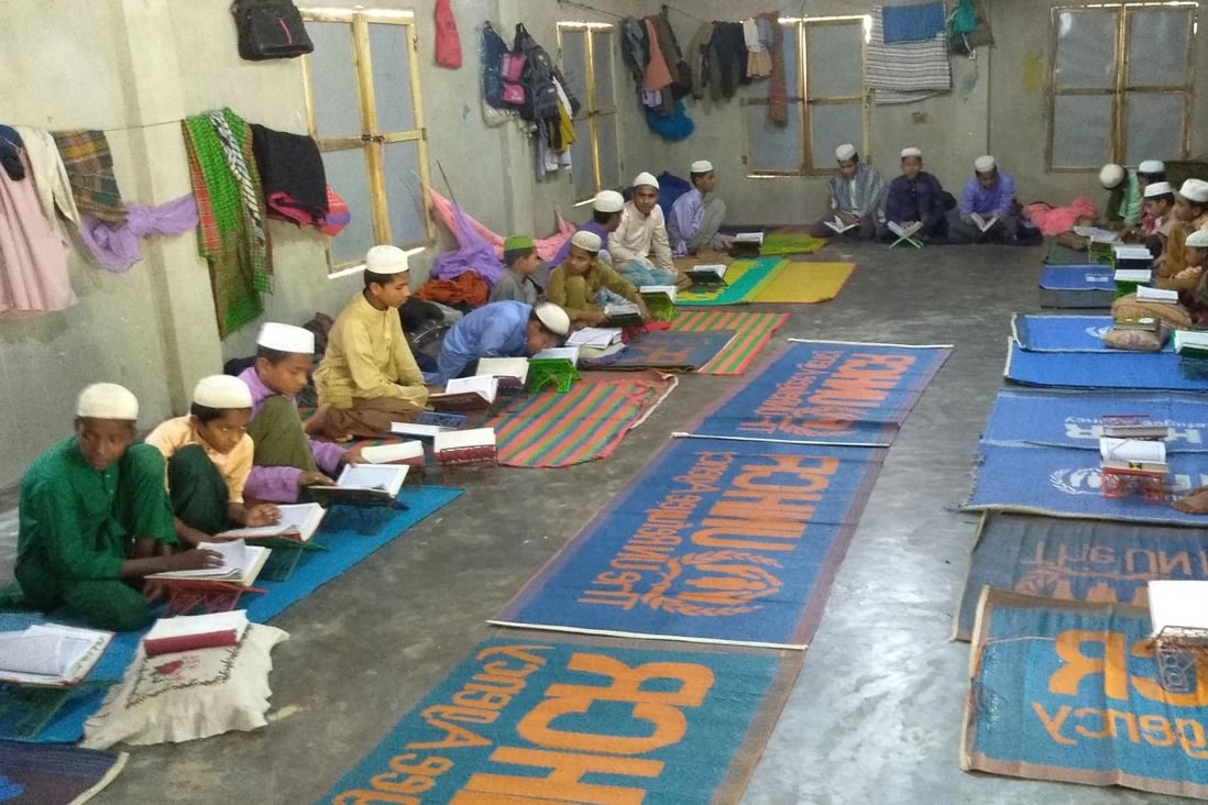 Rohingya refugee children learn the Koran in a madrasa, or Islamic school, in a Rohingya refugee camp in Ukhia. Photo: AFP