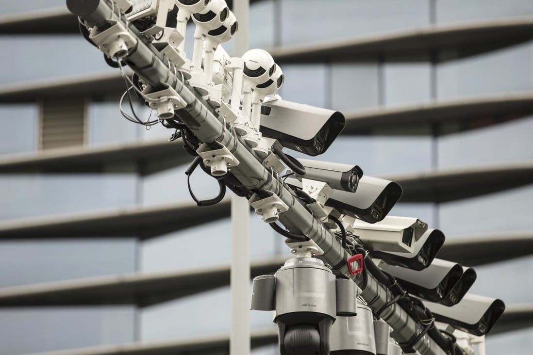 Surveillance cameras manufactured by Hikvision on a post at a testing station near the company’s headquarters in Hangzhou, China. Photo: Bloomberg