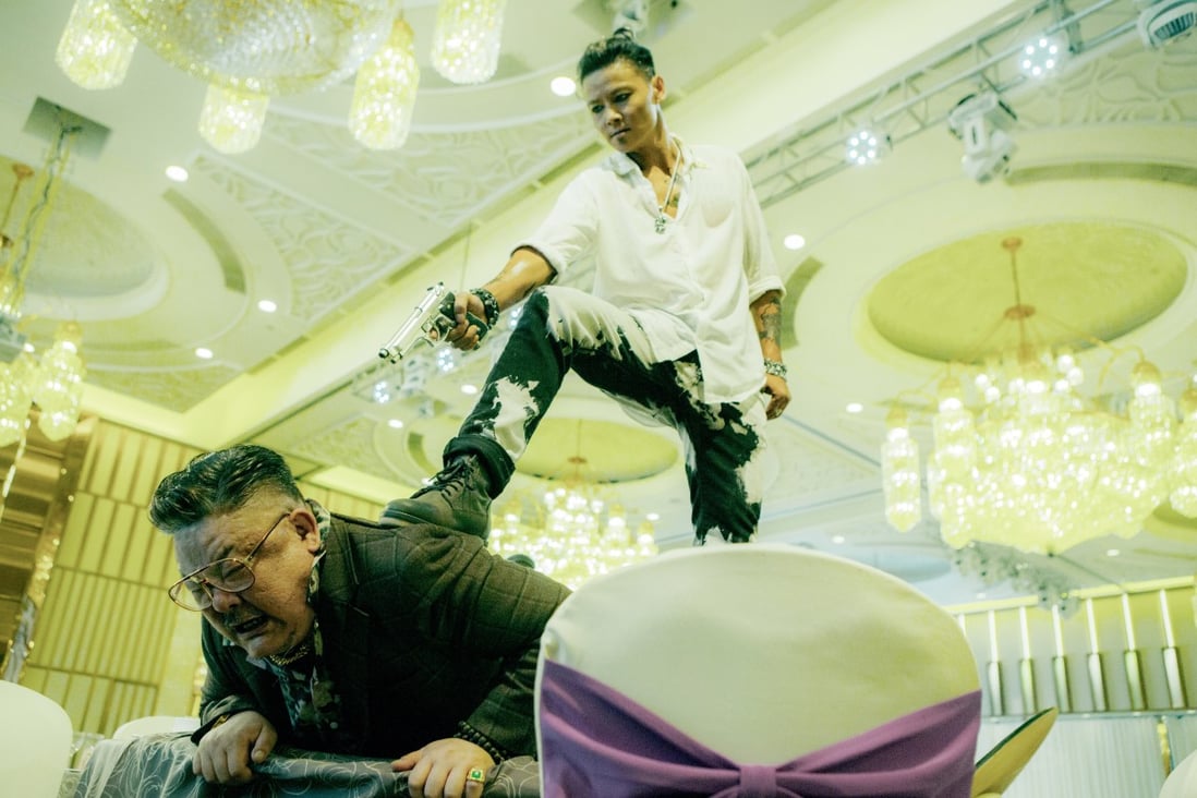 Max Zhang (top) and Lam Suet in a still from Invincible Dragon (category IIB; Cantonese, English), directed by Fruit Chan. Anderson Silva co-stars.