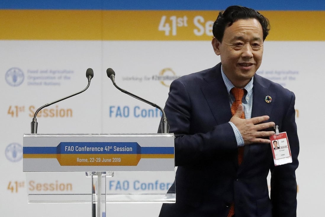 Qu Dongyu reacts after being appointed the new director general of the FAO in Rome on Sunday. Photo: EPA-EFE