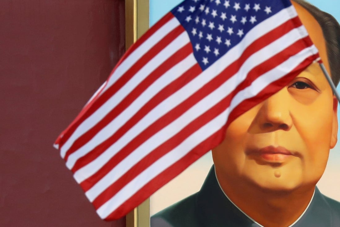A US flag flutters in front of a portrait of the late Chinese Chairman Mao Zedong during a visit by US President Donald Trump to Beijing, China, in 2017. Photo: Reuters