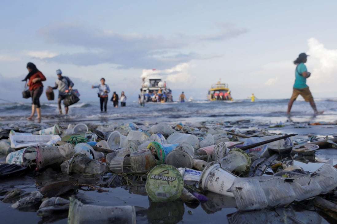 Litter pollutes a beach in Sanur, on the Indonesian island of Bali. Studies have shown that plastic continues to emit harmful greenhouse gases as it enters waste management systems and waterways. Photo: Reuters