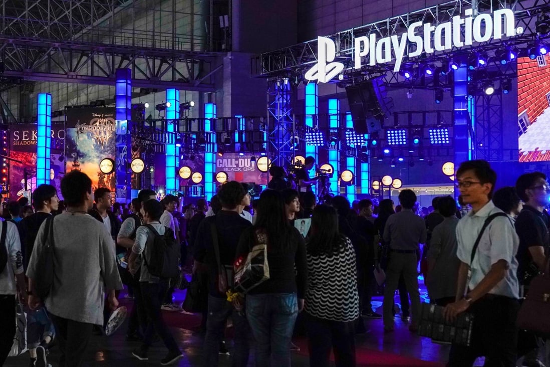 Visitors gather near the Sony PlayStation exhibition booth during the Tokyo Game Show 2018. Photo: EPA-EFE