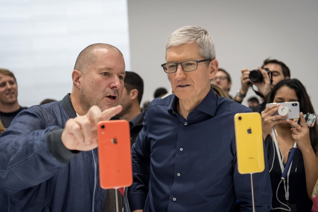 Jony Ive, chief design officer for Apple, left, and Tim Cook, chief executive officer, view a new iPhone during Apple's annual product event.Photo: Bloomberg