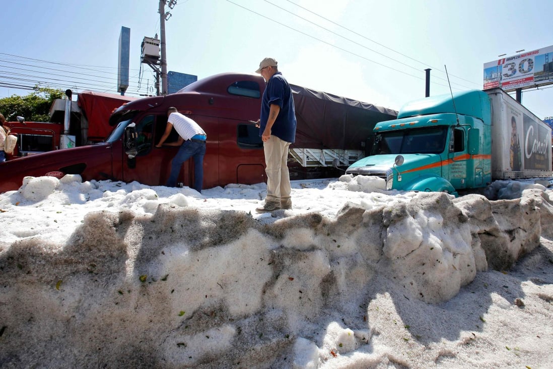 ‘Incredible’ freak hailstorm causes chaos in Mexico’s Guadalajara city