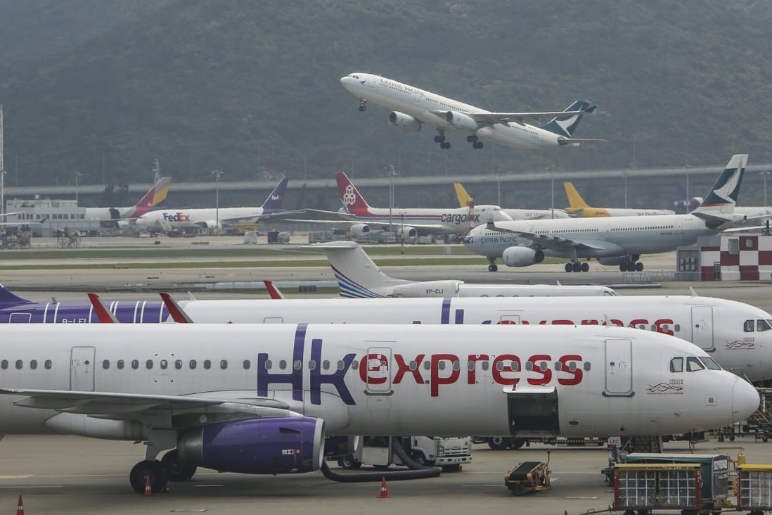 A HK Express Airline plane at Hong Kong International Airport. The budget carrier will be taken over by Cathay Pacific this year. Photo: Winson Wong