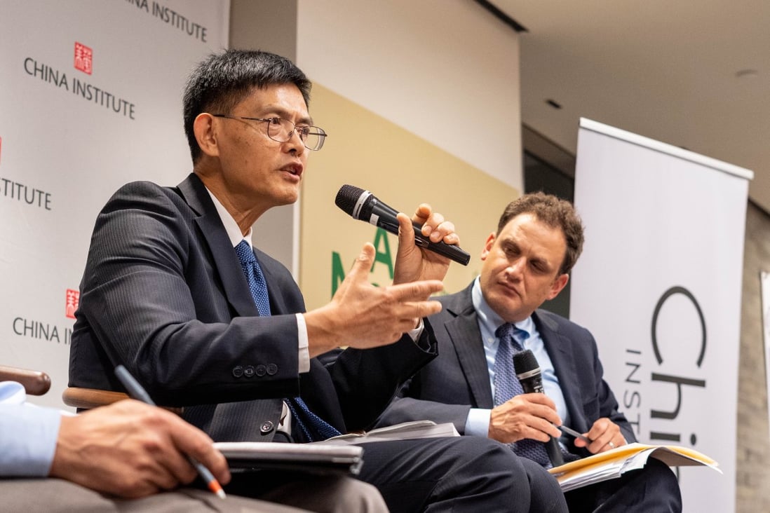 Xiaoxing Xi, Temple University professor, and Aaron Wolfson, lawyer at King & Wood Mallesons, speaking at the China Institute in New York. Photo: China Institute