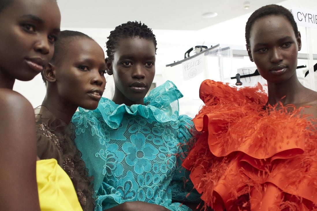 Models Akiima, Shanelle Nyasiase, Ayak Veronica Bior and Nyarach Abouch Ayel, all of Sudanese origin, at the Valentino haute couture show in January 2019 in Paris.