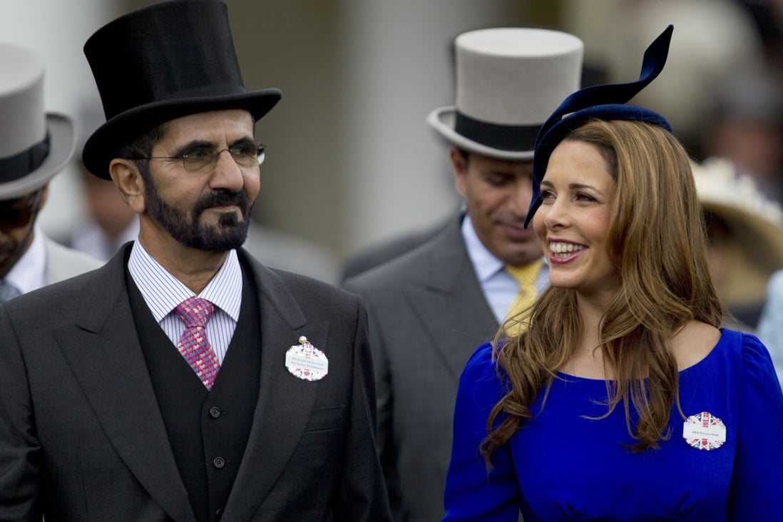 Dubai’s Sheikh Mohammed and Princess Haya walk towards the paddock at Ascot, in Britain, in June 2012. Photo: AP
