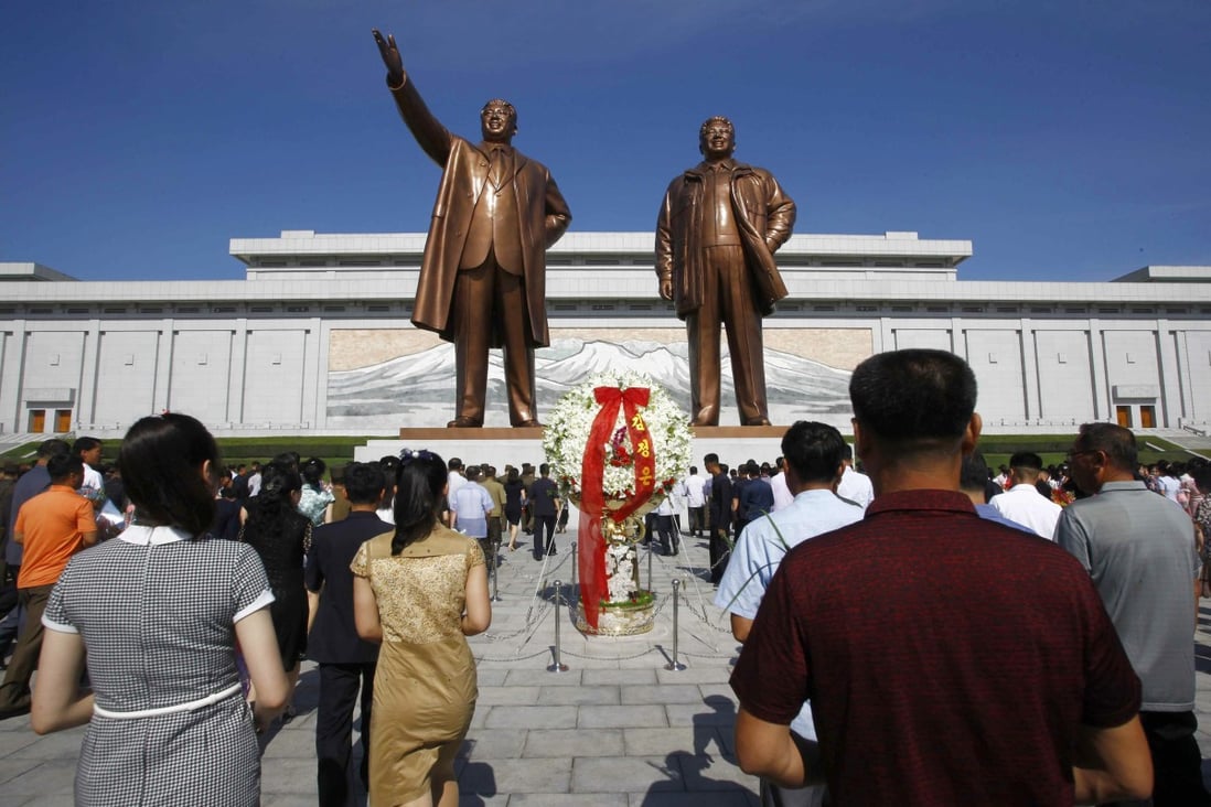 North Koreans visit Mansu Hill to pay tribute to the late leaders Kim Il-sung and Kim Jong-il. Photo: AP
