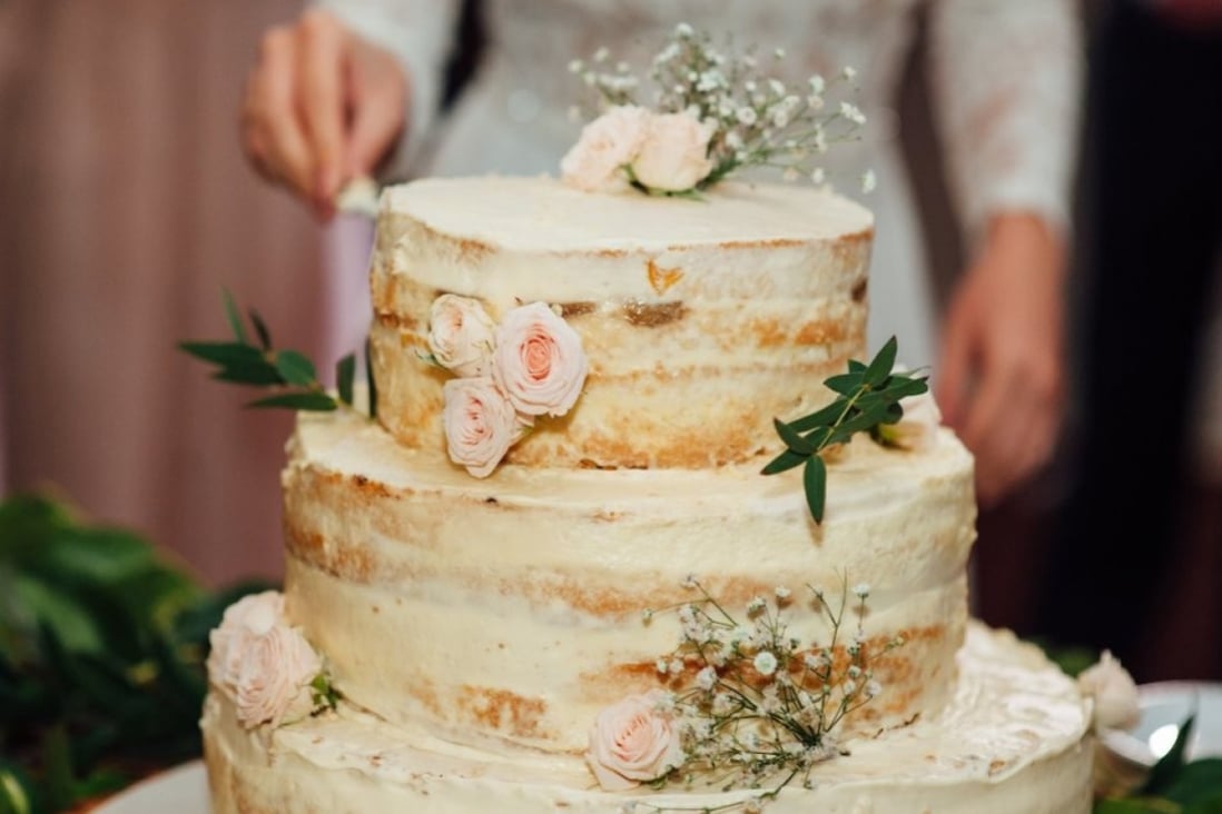 American newlyweds pay an average of US$550 for the cake on their wedding day, but that is far from being the biggest expense when getting married, a new study shows. Photo: Ruslan Shramko/Shutterstock