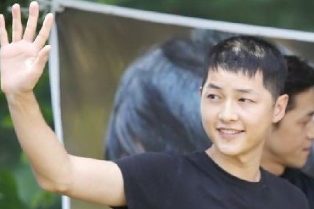 One of the photographs of South Korean actor Song Joong-ki – taken while he was carrying out his compulsory national service with the South Korean Army in 2013 and 2014 – which suggests he has been suffering from hair loss.
