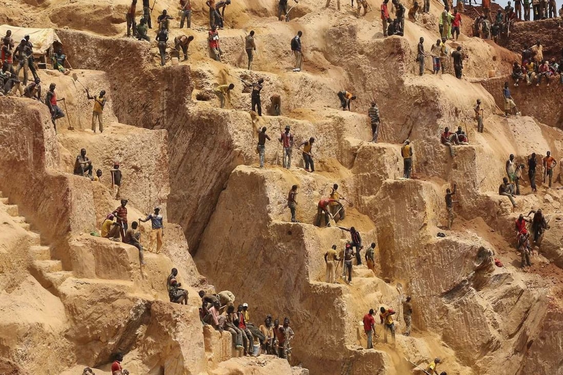 Prospectors work at the open-pit Djoubissi gold mine, north of Bambari, a town in the Central African Republic. A report File photo: Reuters