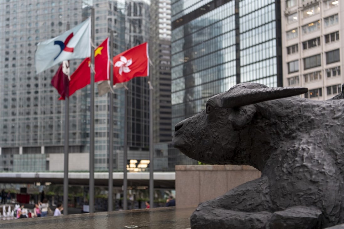 A bronze sculpture of a bull looks over Exchange Square in Central where Hong Kong’s stock exchange stands. Hong Kong’s position as the most important financial market in Asia relies on freedom of information. Photo: Warton Li