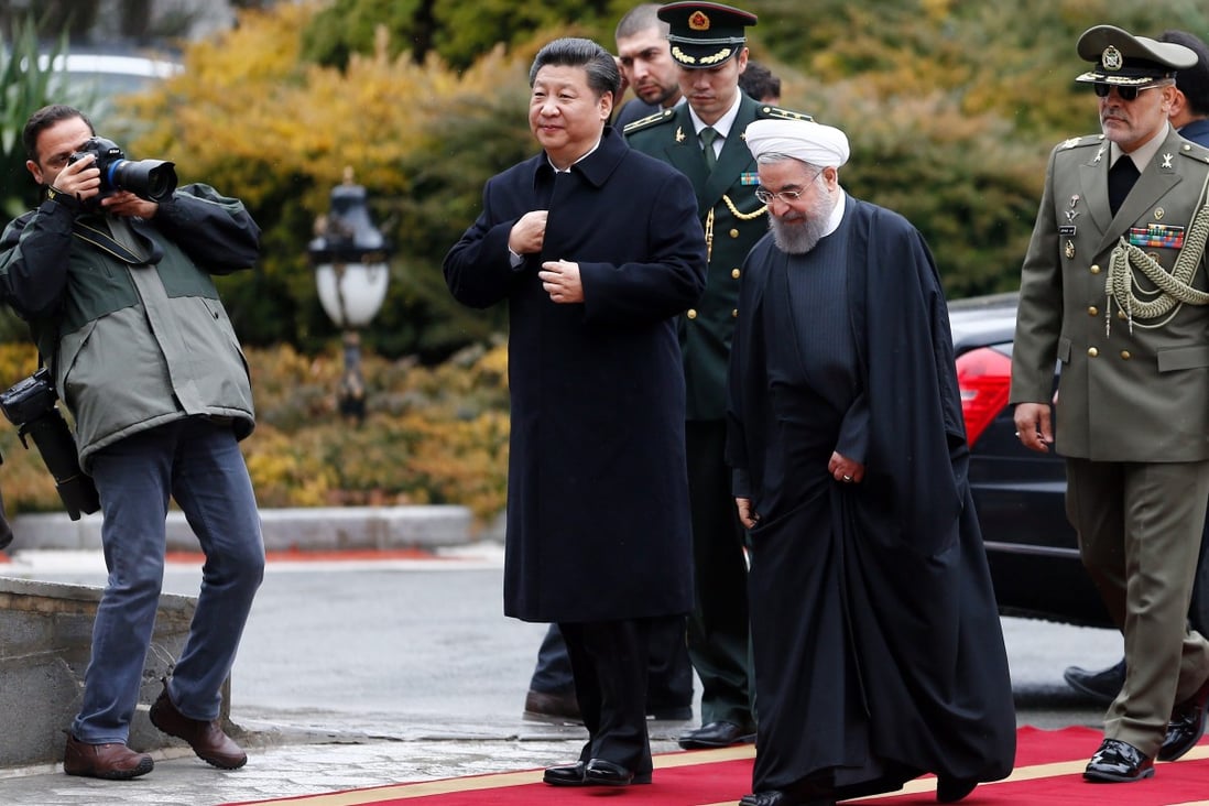 Iranian President Hassan Rowhnai and his Chinese counterpart Xi Jinping meet at a welcome ceremony at the presidential palace in Tehran in January 2016. Iran is one of the biggest suppliers of crude oil to energy-hungry China, and a war between Iran and the US would threaten China’s supply from the Middle East as a whole. Photo: EPA