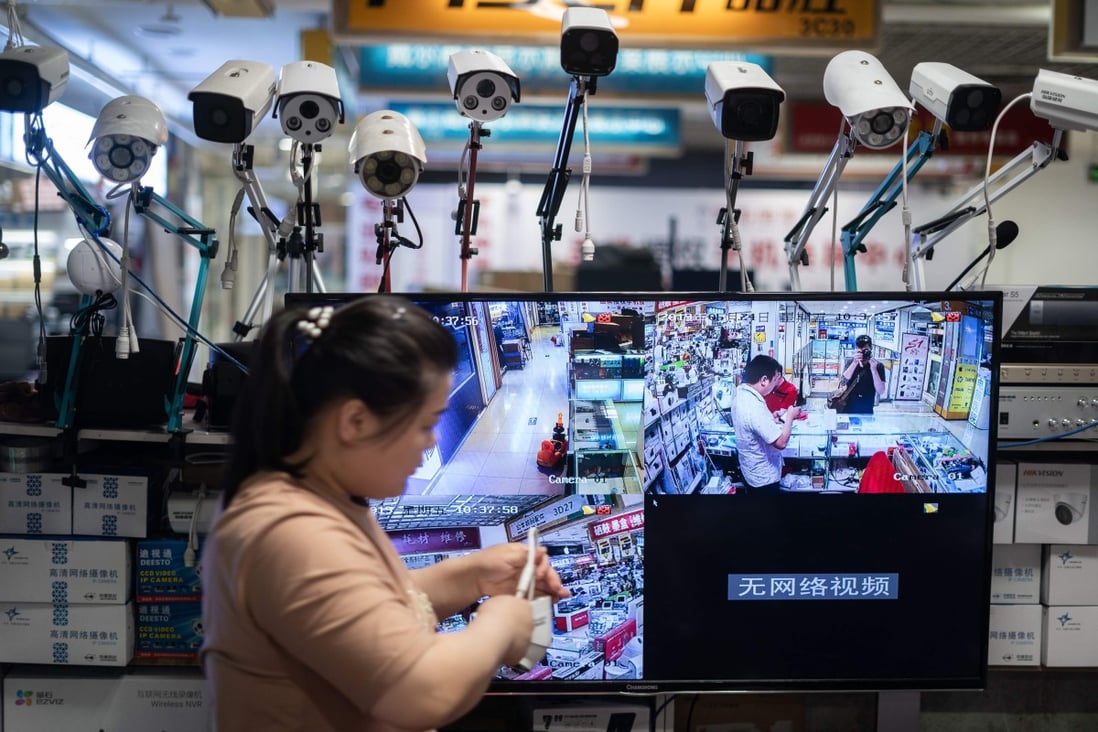 Picture of Hikvision cameras in an electronic mall in Beijing on May 24, 2019. - Shares in two top Chinese surveillance firms plunged on May 22 following reports Washington is considering banning them from buying US components, just as the blacklisting of telecoms giant Huawei fanned their escalating tech war. (Photo by FRED DUFOUR / AFP)