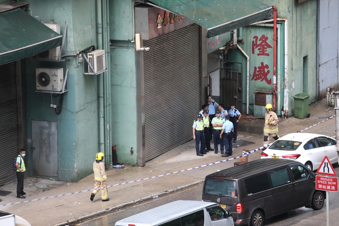Officers at the factory site in Tsuen Wan. Photo: Felix Wong