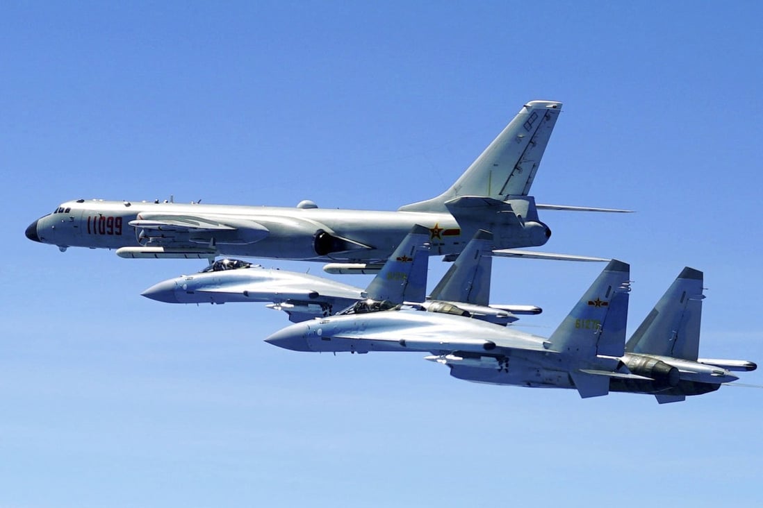 Two Su-35 fighter jets and a H-6K bomber of the People's Liberation Army Air Force on patrol over the Luzon Straits near Taiwan. Photo: AP